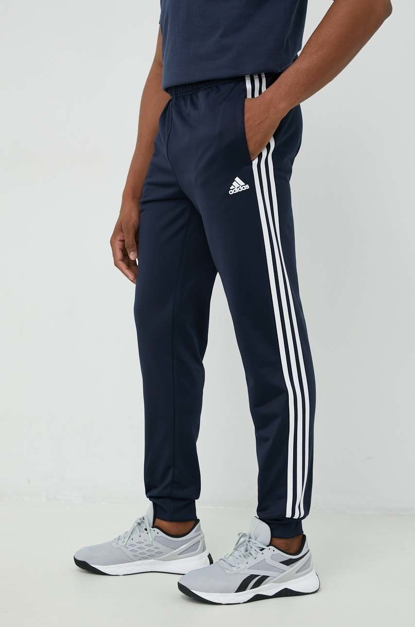 Men's Clothing - Essentials French Terry Tapered Cuff 3-Stripes Pants -  Blue | adidas Oman